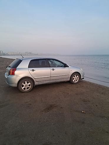 maşın satış: Toyota Corolla (hatchback), gümüşü rəng. - Kuzov: 5 qapılı hatchback — 2
