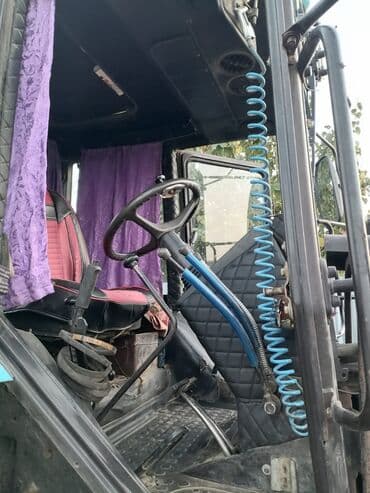 dt 75 satiram: Tecili satilir yaxsi veziyyetdedir senetleride qaydasindadir. elave — 9