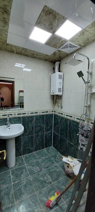 lokbatanda yeni tikilen binalar: Yeni Guneslide d massivində mecitə yaxin 10 mertebeli binanın 3-cu — 6