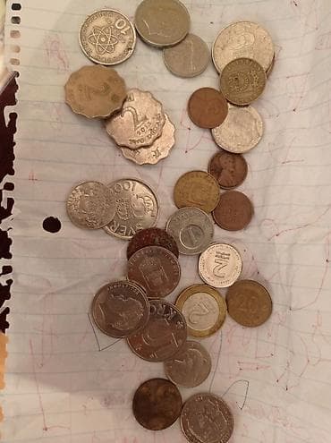 1 cent neçə manatdır: Xarici ölkələrin qəpikləri satılır . 10-12 ölkənin qəpikləri var — 2