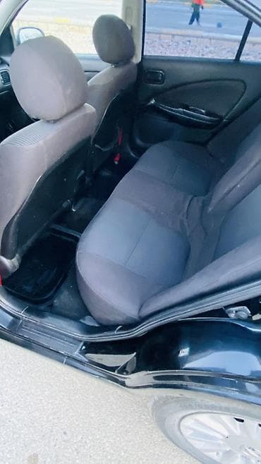scooter az: Nissan Almera Classic sedan - Kuzov: qara rəng, 4 qapı, arxa şüşədə — 5