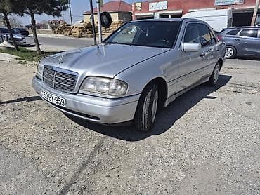 195 65 15 teker: Mercedes-Benz C-Sinif sedan, gümüş rəng. - Kuzov: 4 qapı, klassik W202 — 4