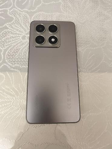 Мобильные телефоны и аксессуары: Xiaomi 14T, 256 ГБ, цвет - Серый, 
 Отпечаток пальца — 3