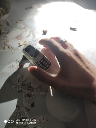 fly телефон раскладушка с большими кнопками: Ultra-mini klassik düyməli telefon - Çox kiçik ölçü: ovuca sığan — 3