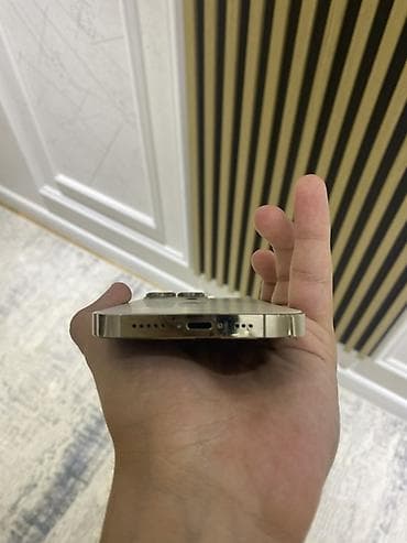 apple 12işlenmi: IPhone 14 Pro, 128 GB, Matte Gold, Barmaq izi, Simsiz şarj, Face ID — 10