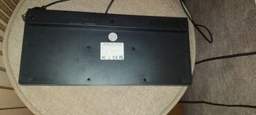 Funksional və rahat bu qara naqilli klaviatura həm ev, həm də ofis