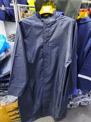 Tünd mavi rəngdə yağmurluq/paltar qoruyucu plaş. - Suya davamlı lalafo.az -da Tünd mavi rəngdə yağmurluq/paltar qoruyucu plaş. - Suya davamlı