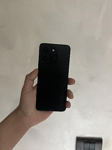 iphone 12 az: Honor X6a, 128 GB, rəng - Qara, Barmaq izi, Face ID — 8