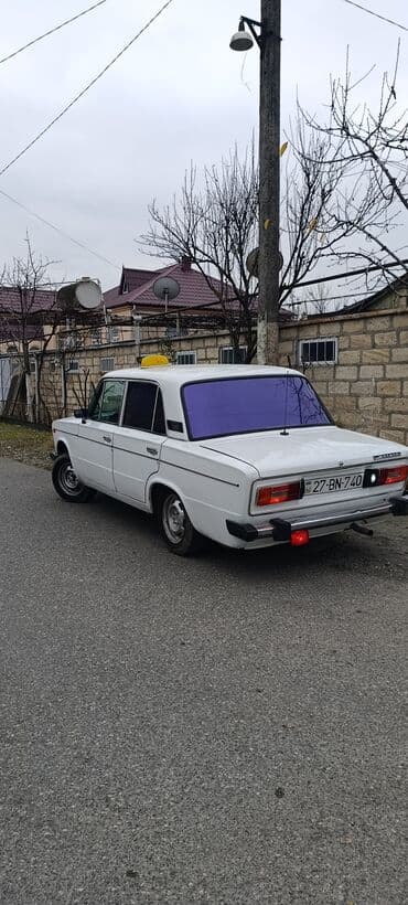 ваз 2111: VAZ 2106, ağ rəng, sedan kuzov. Klassik “Jiquli” znaki. ij təkərlər — 3