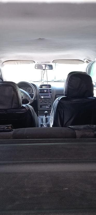 opel astra baqaj: Opel Astra Caravan (universał) – gümüşü rəngli, 5 qapılı ailə və — 5