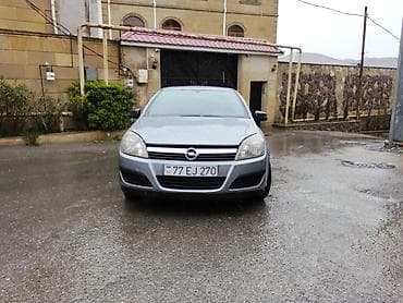 Opel Astra H, 5 qapılı hetçbek, boz rəng. - Yığcam və praktik kuzov