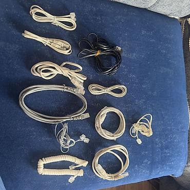 simsiz internet modemleri: İnternet və telefon bağlantısı üçün müxtəlif kabel dəsti. Tərkib: - — 9