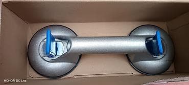 Şüşə və güzgü götürən Sumqayıt
