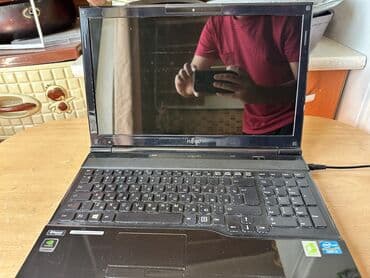 china aid notebook: Intel Core i7, 8 GB, 15.6 " — 4
