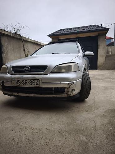 kia optima 2013: Opel Astra Caravan (universal) – gümüş rəngli kuzov, 5 qapı, dam — 6