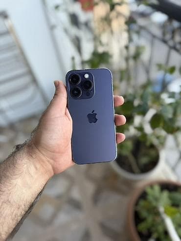 nintendo switch oled qiymeti: IPhone 14 Pro, Deep Purple, Face ID — 3