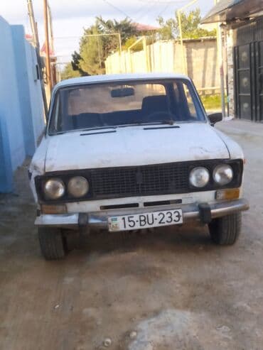 ваза стеклянная прозрачная высокая без узора: VAZ 2106, ağ rəngli, sedan kuzov. Xüsusiyyətlər: - Klassik “06” — 1