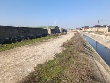 1 sot neçə metrdir: Maştağa Buzovna yolunda, beton su kanalının kənarında, 131 nömrəli — 3