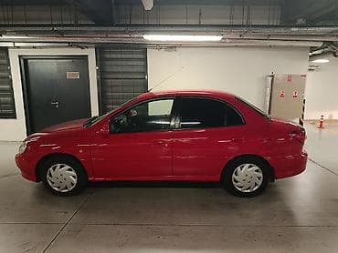 triangle teker: Kia Rio: 1.5 l | 2002 il Sedan — 5