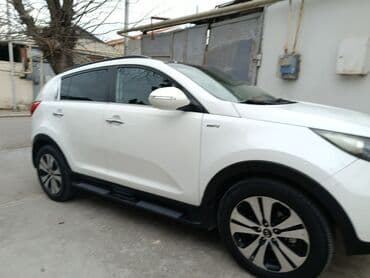 optima kia: Kia Sportage: 2 l | 2011 il Krossover — 4