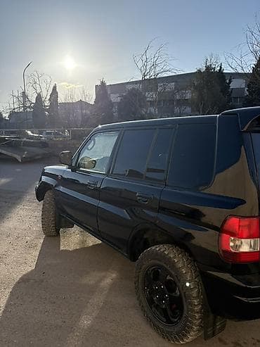 04 maşınlar: Mitsubishi Pajero: 1.8 l | 2000 il 394000 km Ofrouder/SUV — 5