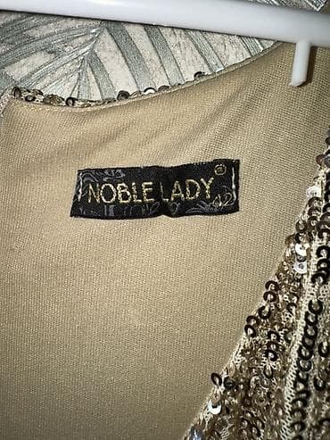 mexmer parca: Brend: NOBLE LADY Ölçü: 42 (etiketdə göstərilib) Model: Payetli — 2