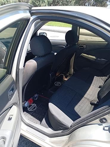 Nissan Sunny: 1.6 l | 2008 il Sedan — 6