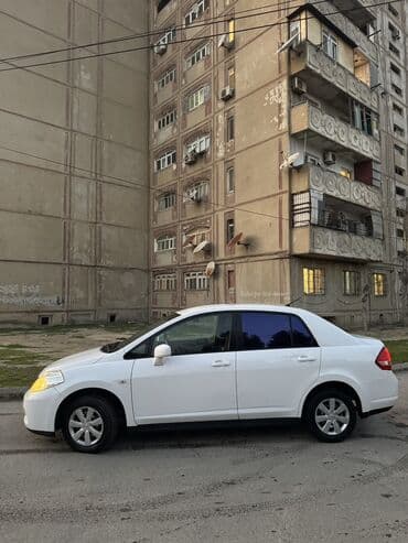 Digər nəqliyyat: Nissan Tiida sedan – ağ rəng, avtomatik ötürmə. Xarici və daxili: - — 9
