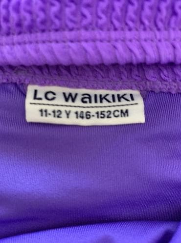 Çimərlik geyimləri: LC Waikiki uşaq bədən ölçüsü: 11–12 yaş, 146–152 sm. Məhsul: Qız — 2