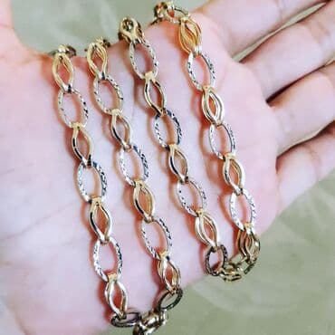 italyan qizili: Dəstə daxildir: Bilərzik, Sep, Sarı qızıl, 585 Əyar, 1714 g — 2