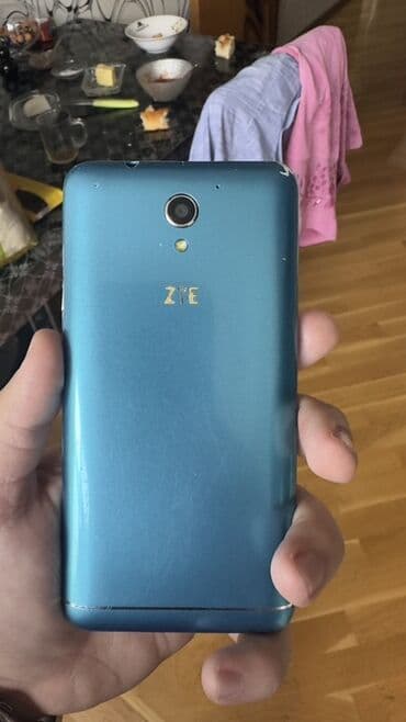 телефон fly iq4412 quad: ZTE v889m, 512 ГБ, цвет - Голубой, Кнопочный, Сенсорный, Отпечаток пальца — 2