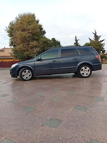 winda teker evi: Opel Astra H Caravan (universal kuzov) - Kuzov: universal, 5 qapı - — 5
