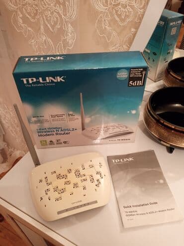 router: TP-LINK
1-Port 150Mbps
Wireless N ADSL2+
Modem Router — 2