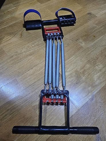 Məhsul: Yaylı çoxfunksiyalı fitnes trenajoru (qapı ekspanderi/rezinli