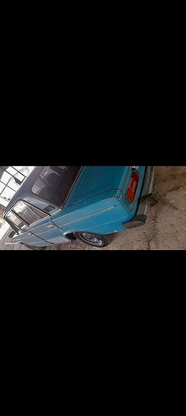 uc təkərli: Model: Lada (VAZ) 2106 sedan Kuzov: 4 qapı, mavi rəng Yürüş — 3