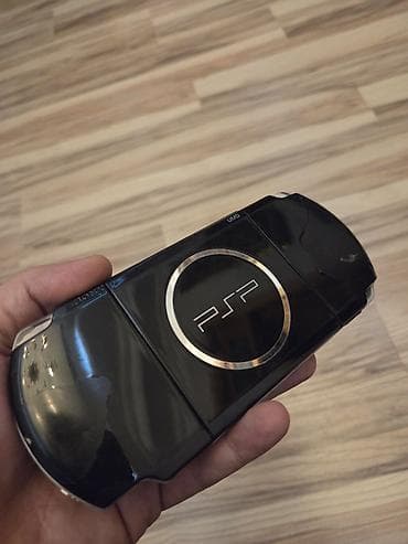 psp 1001: Sony PSP (PlayStation Portable) – qara rəng - 4.3" geniş ekranlı — 2