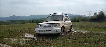 Nəqliyyat: Mitsubishi Pajero: 1.8 l | 1999 il 30000 km Sedan — 5