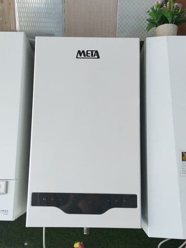 italtherm kombi qiymeti: Ağ rəngdə, divara quraşdırılan "Meta" markalı qaz qazanı. Kompakt — 1