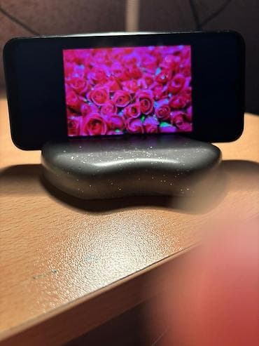 nikura smart tv: Təsvir: - Telefon üçün dekorativ dayaq/stand - Apple loqosu — 2