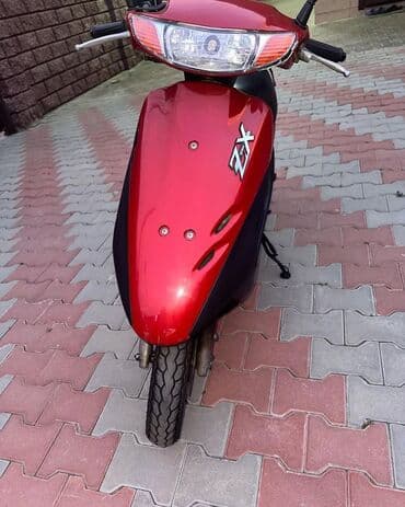 w202 dönmə işığı: Qırmızı rəngdə ZX skuter Məlumat: - Kompakt və yüngül kuzov, şəhər — 4