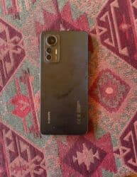 xiaomi note 10 lite qiymeti: Xiaomi 12 Lite, 256 GB, 
 İki sim kartlı, Barmaq izi, Face ID — 2