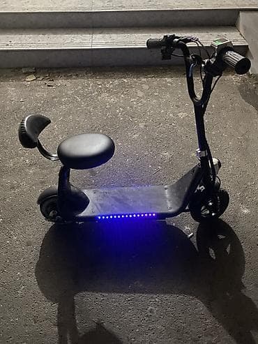 Oturacaqlı elektrik skuter -saatda 20 km surerle hereket edir