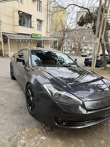 купе: Idman üslublu kupe avtomobil - Kuzov: 2 qapılı kupe, qara/boz rəngli — 2