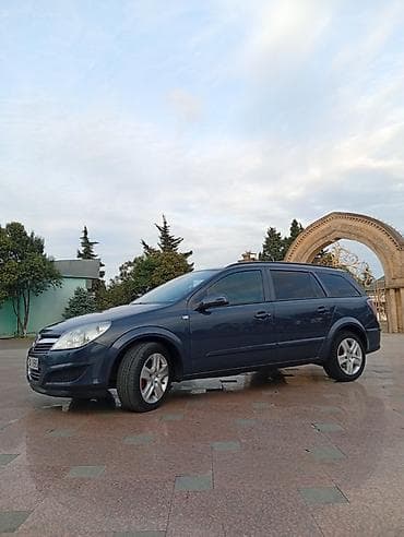 winda teker evi: Opel Astra H Caravan (universal kuzov) - Kuzov: universal, 5 qapı - — 4