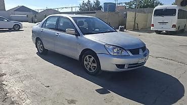 ford focus hatchback: Mitsubishi Lancer: 1.6 l | 2006 il 466000 km Sedan — 2