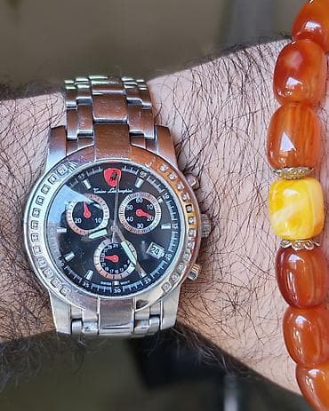 euro wolf utu: Tonino Lamborghini kişi qol saatı - Brend və model: Tonino — 1