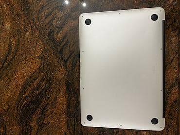 ucuz macbook air: Apple MacBook Air (13") – gümüş rəng, alüminium gövdə. Xüsusiyyətlər — 3