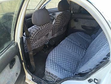 07 stop: Hyundai Accent: 1.5 l | 1995 il Sedan — 5