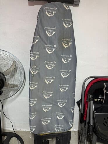 вешак для одежды: Ütüu stolu — 1