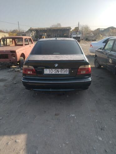 bmw 3 серия 330xd at: BMW 5 Series E39 sedan - Korpus: 4 qapılı sedan, tünd yaşıl rəng — 1